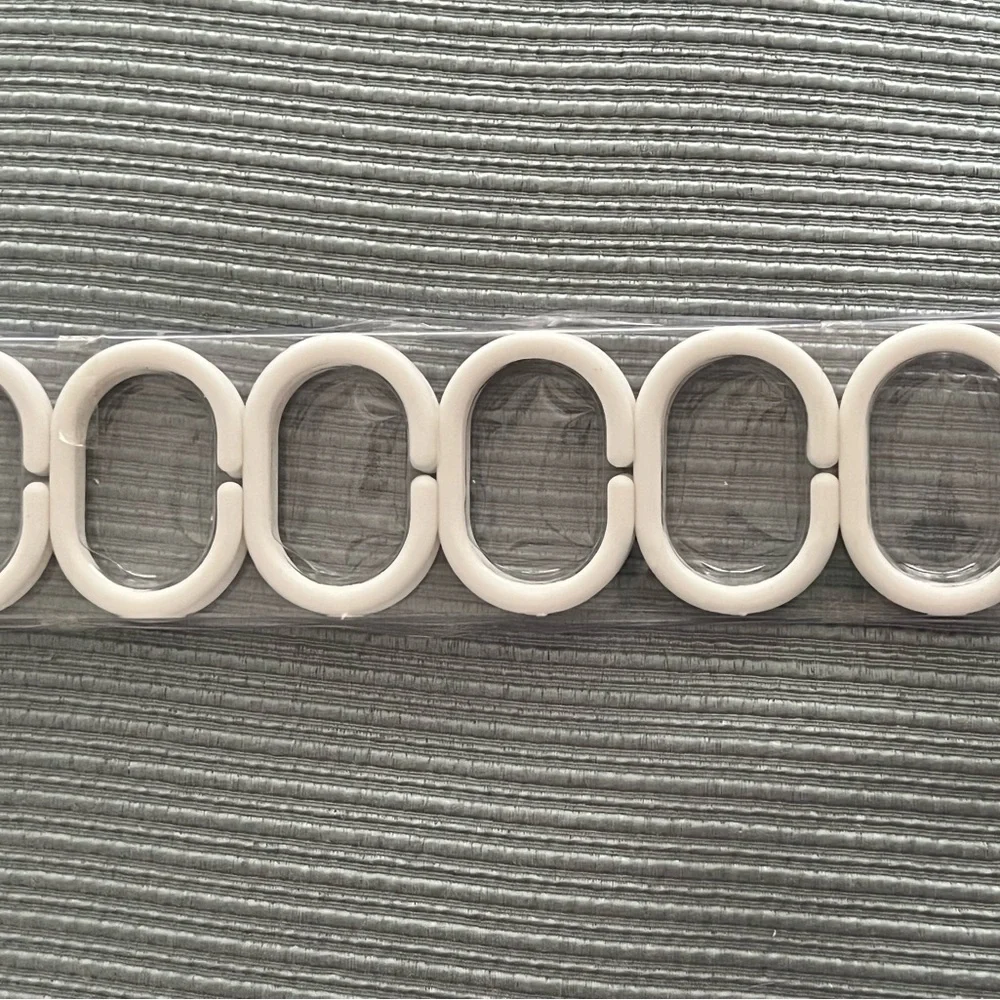 Plastic hooks for shower curtains
